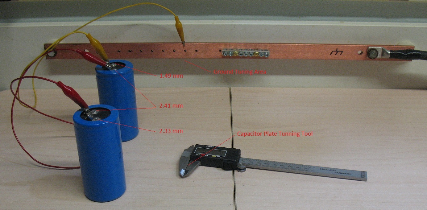 Capacitor Setup With Ground Bar Photo